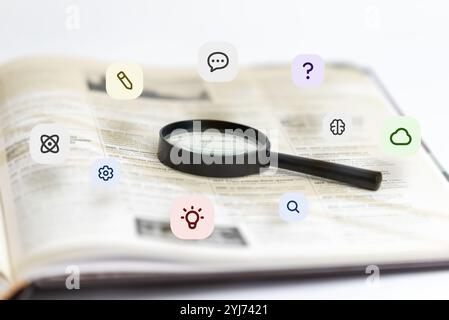 Magnifying glass over book with floating icons: atoms, pencils, ideas, dialogue bubbles. Perfect for education, research, knowledge, creative thinking Stock Photo