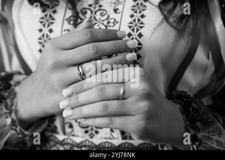 Elegant Hands Adorned with Traditional Rings. Stock Photo