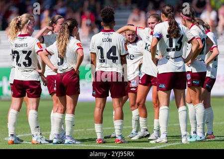 Adelaide players form a huddle during the A-League Women Rd2 match between the Wanderers and Adelaide at Wanderers Football Park on November 10, 2024 Stock Photo