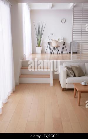 Room With Step Simple living room with step floor Stock Photo - Alamy