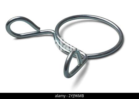 close-up of metal hose clip or clamp isolated white background, used in plumbing and household gas or water hoses, self clamping and spring type Stock Photo
