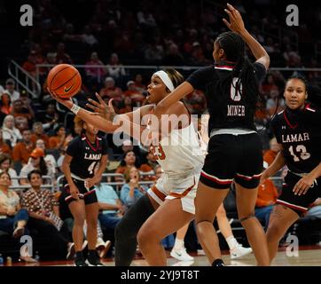 Austin, Texas, USA. 13th Nov, 2024. Texas forward AALIYAH MOORE (23) works under the basket against Lamar forward T'AALIYAH MINER (0) during the first half of a women's college basketball game between the Texas Longhorns and the Lamar Cardinals on November 13, 2024 in Austin, Texas. (Credit Image: © Scott Coleman/ZUMA Press Wire) EDITORIAL USAGE ONLY! Not for Commercial USAGE! Stock Photo