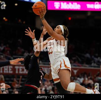 Austin, Texas, USA. 13th Nov, 2024. Texas forward AALIYAH MOORE (23) goes to the basket during the second half of a women's college basketball game between the Texas Longhorns and the Lamar Cardinals on November 13, 2024 in Austin, Texas. (Credit Image: © Scott Coleman/ZUMA Press Wire) EDITORIAL USAGE ONLY! Not for Commercial USAGE! Stock Photo