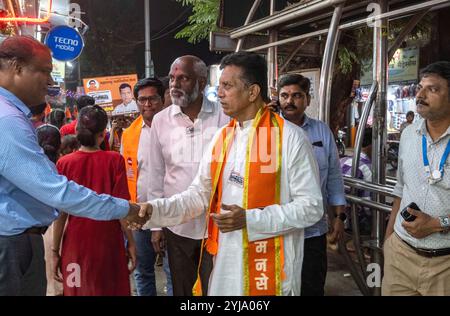 Mumbai, India. 12th Nov, 2024. MUMBAI, INDIA - NOVEMBER 13: MNS candidate from Sion Koliwada Sanjay Bhogale campaigns for Maharashtra assembly elections at Sion on November 12, 2024 in Mumbai, India. (Photo by Satish Bate/Hindustan Times/Sipa USA) Credit: Sipa USA/Alamy Live News Stock Photo