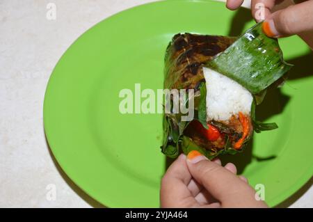 Nasi bakar or roasted rice typical culinary Jakarta Stock Photo