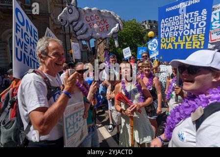 London, UK. 30th June 2018. Campaigners from Huddersfield Royal Infirmary before thousands march through London from the BBC to a rally near Downing St to celebrate 70 years of the NHS, and to support its dedicated workers in demanding a  publicly owned NHS that is free for all with proper funding and proper staffing  and providing a world class services for every community. The protest, organised by the the People's Assembly, Health Campaigns Together, Trades Union Congress, Unison, Unite, GMB, British Medical Association, Royal College of Nursing, Royal College of Midwives, CSP, BDA, and SoR Stock Photo