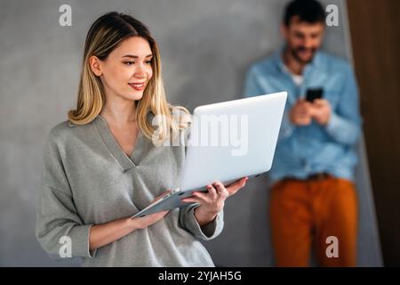 Success woman freelancer is working on a new project on laptop. Work business people concept. Stock Photo