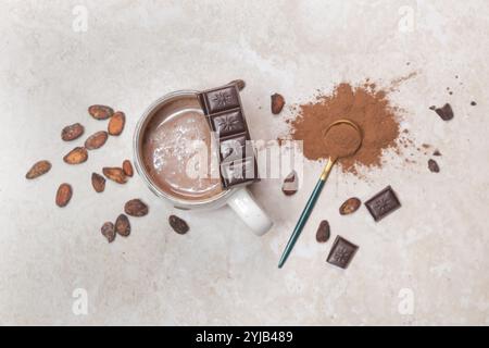 Cocoa in different presentations, hot drink, beans, powder and chocolate bar Stock Photo