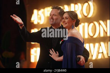 Cairo International Film festival in Egypt Egyptian actor Mohamed Mahmoud Abdel Aziz and his wife on the red carpet during the opening ceremony of the 45th Cairo International Film Festival CIFF in Cairo, Egypt, 13 November 2024. The CIFF will run from 13 to 22 November 2024. Cairo Egypt Copyright: xMatrixxImagesx/xKhaledxElfiqix Stock Photo