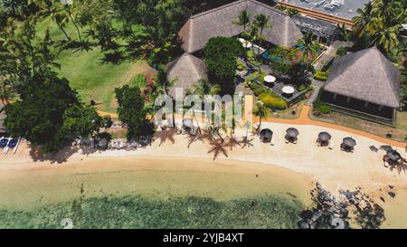 An aerial view capturing the beach and resort in Mauritius, showcasing the stunning coastline and luxurious accommodations. Stock Photo