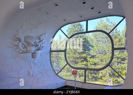 Artistic Interior with Unique Window Overlooking Forest Stock Photo
