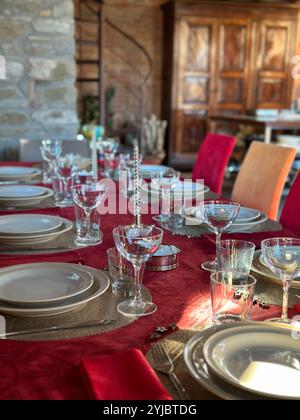 beautiful table setting with christmas decoration in living room Stock Photo