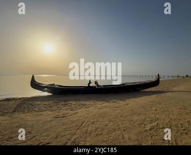 old boat on the beach in the sunset egypt on the red sea Stock Photo