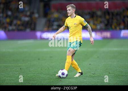 MELBOURNE, AUSTRALIA. 14th November 2024. Pictured: Riley McGree of Australia during the Group C Australia vs Saudi Arabia AFC World Cup Qualifiers 3rd Round from Melbourne's Rectangular Stadium at AAMI Park on the 14th November 2024. Credit: Karl Phillipson/Alamy Live News Stock Photo