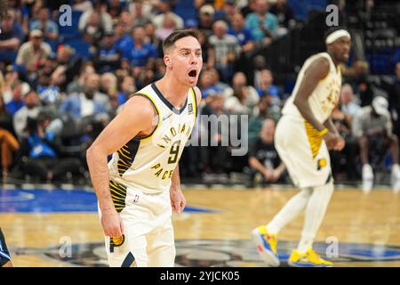 Orlando, Florida, USA, November 13, 2024, Indiana Pacers guard TJ McConnell #9 yells at a Magic fan at the Kia Center. (Photo Credit: Marty Jean-Louis/Alamy Live News Stock Photo