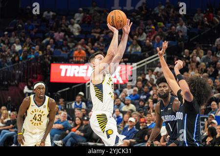 Orlando, Florida, USA, November 13, 2024, Indiana Pacers guard TJ McConnell #9 attempt to score at the Kia Center. (Photo Credit: Marty Jean-Louis/Alamy Live News Stock Photo