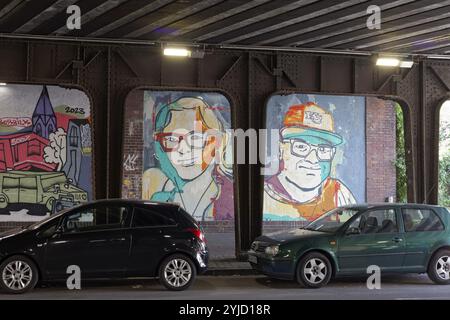 Mural with portraits of two real people in a subway, urban art in the Oberbilk district, Duesseldorf, North Rhine-Westphalia, Germany, Europe Stock Photo