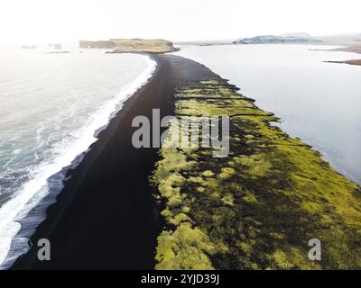 Volcanic black basalt rocks on the rugged coastline of São Miguel ...
