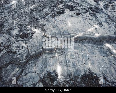 Geldingadalir active Volcano, errupting in 2021, Fagradalsfjall and 2022 -Meradalir. Still hot lava rocks, steam comping up from the grounds. Dark gre Stock Photo