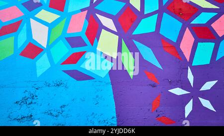 Vibrant Abstract Geometric Mural in Motion Eye-Level Perspective Stock Photo