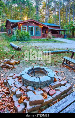 Rustic Cabin and Fire Pit in Autumn Forest Eye Level Perspective Stock ...