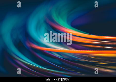 This image showcases a dynamic, abstract swirl of colorful light trails, creating a sense of motion and energy. Stock Photo