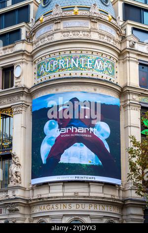Advertising billboard for Carhartt Work in Progress (Carhartt WIP), an American streetwear clothing brand, on the facade of the Printemps, Paris Stock Photo