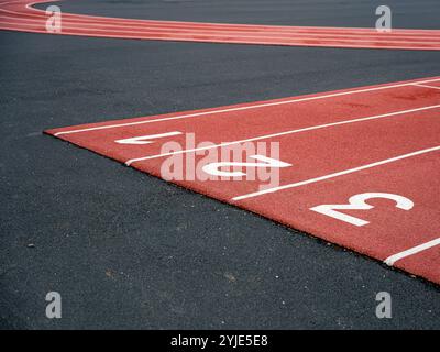 Close-Up of Running Track with Lane Numbers Stock Photo