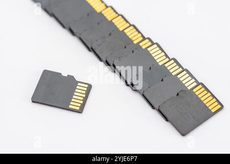 Batch of 16GB MicroSD cards ready for recycling. Despite their small size old SD cards can be useful when a single file needs to be transferred. Stock Photo