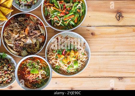 The Khao Soi Yuan Naan that is served on the plate is Khao Soi noodles mixed with minced pork spring onion coriander and chili lime and sesame spicy a Stock Photo