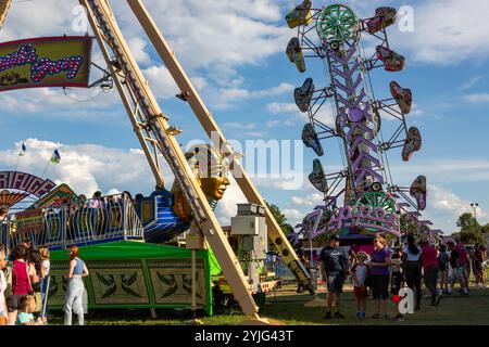 The amusement rides 'Pharaoh's Fury' and 'The Zipper' at the Allen County Fair in Fort Wayne, Indiana, USA. Stock Photo