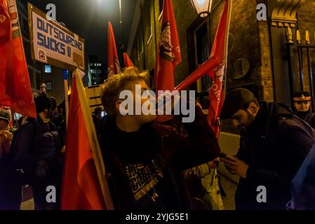 London, UK. 6th March 2018. Outsourced workers, including cleaners, security officers, receptionists, porters and gardeners who keep the university running smoothly protest noisily outside University of London Vice Chancellor Sir Adrian Smith's graduation dinner, calling on the university to employ them directly, for an end to zero hours contracts and to implement promised pay rises. Currently they are employed by contractors under worse holiday entitlements, sick pay, pensions and paternal leave than university employees, and are often subjected to discrimination, bullying and unfair deductio Stock Photo