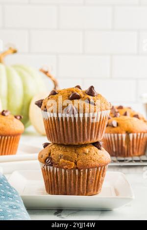 Stacked pumpkin chocolate chip muffins Stock Photo