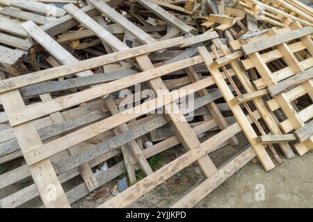 Stacked Wooden Pallets on Construction Site Stock Photo