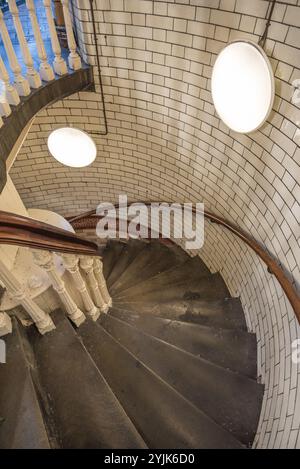 Staircase to the upper balcony level of the indoor Kirkgate market Hall in Leeds, West Yorkshire UK Stock Photo