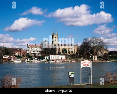 United Kingdom. England. London. Hampton Thames Riverside. The Bell Inn & St Mary's Church. Ferry crossing sign. Stock Photo