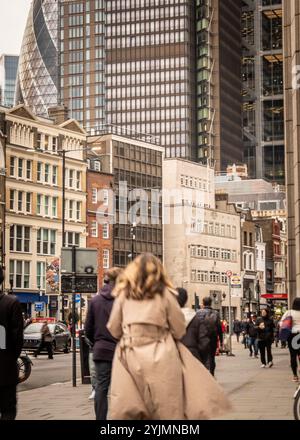 London city street scene with financial buildings and motion blurred people Stock Photo