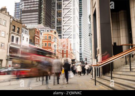 London city street scene with financial buildings and motion blurred people Stock Photo