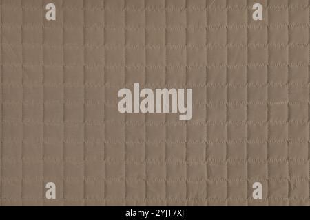 Checkered stitching pattern, brown quilted fabric background. Blanket or puffer jacket, stitch square texture close up, macro. Wallpaper, backdrop. Stock Photo