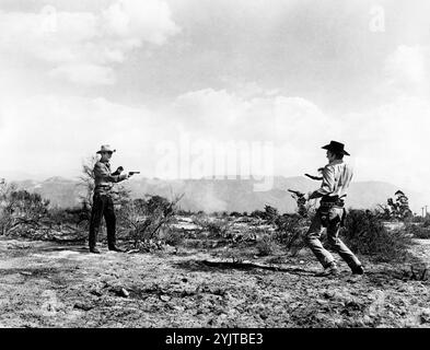 Randolph Scott, Forrest Tucker, on-set of the western film, 'Gunfighters', Columbia Pictures, 1947 Stock Photo