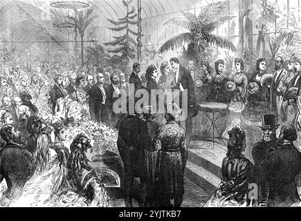 Evening Fete of the Royal Botanic Society's Gardens, Regent's Park, [London], 1872. '...the conservatory and several marquees were crowded with fashionable company. The grounds were lit up with great brilliancy, and the scene was very gay and beautiful. Lime lights fixed in several parts made their neighbourhood as bright as noonday; whilst oil lights, marking the formation of the principal walks, reminded us of the past glories of Vauxhall..In the large exhibition marquee the band of the 1st Life Guards played a selection of music during the evening...It was stated that the Royal visitors wou Stock Photo