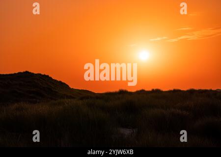 Sunset with intense orange sky Stock Photo