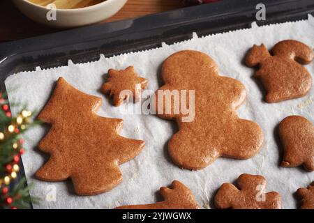 Homemade gingerbread Christmas cookies on a baking sheet Stock Photo