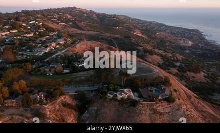 Sunset view of the Portuguese Bend neighborhood of Rancho Palos Verdes, California, USA, where landslides are eroding the slopes. Stock Photo