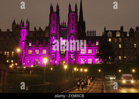 Edinburgh, Scotland, UK. 14th November, 2024.  UK Weather:  Autumn weather anticyclonic gloom saw christmas arrive in edinburgh with the dazzling frontage of edinburgh university new college school of divinity on the mound with a myriad of colours and designs for the festivities,. Credit Gerard Ferry/Alamy Live News Stock Photo