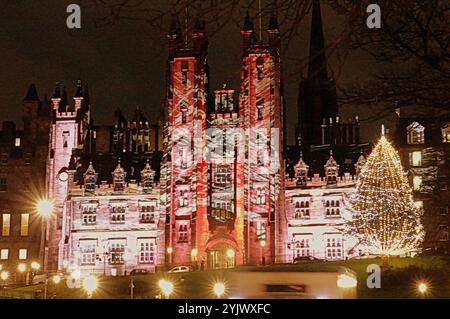 Edinburgh, Scotland, UK. 14th November, 2024.  UK Weather:  Autumn weather anticyclonic gloom saw christmas arrive in edinburgh with the dazzling frontage of edinburgh university new college school of divinity on the mound with a myriad of colours and designs for the festivities,. Credit Gerard Ferry/Alamy Live News Stock Photo