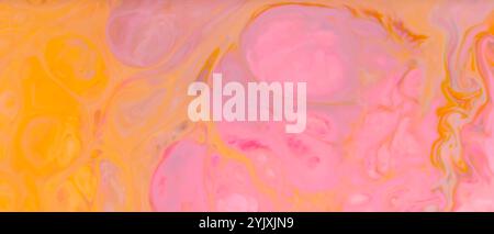 Abstract Fluid Art Background with Swirling Pink and Orange Colors Creating Dynamic Patterns Stock Photo