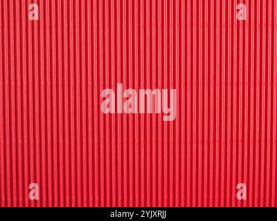 Red cardboard or paper texture using as holiday background or header Stock Photo