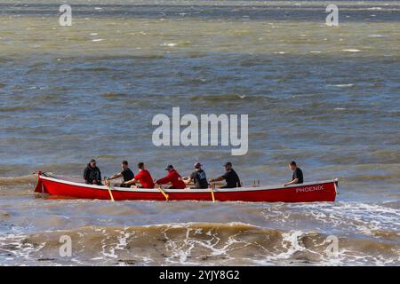 Pilot gig racing off Clevedon beach Stock Photo - Alamy