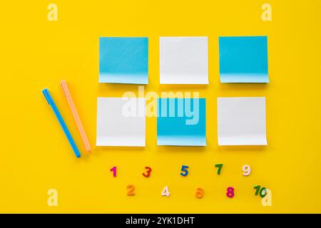 Sticker Back to school concept.Top view of school supplies on yellow background empty space for text. Flat lay of kindergarten or school supplies. Stock Photo